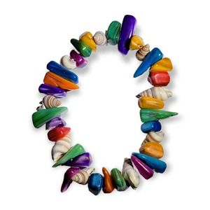 Bright, multi-colored rocks and shells on a stretchy bracelet